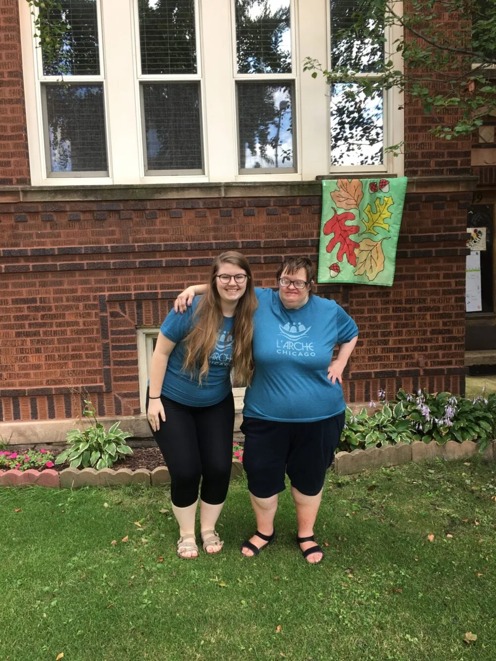 Molly and Christianne outside Angel House