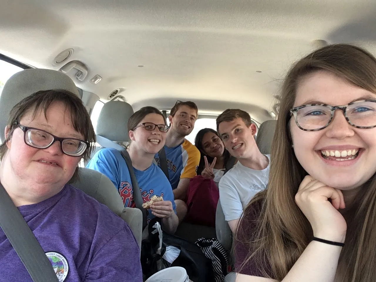 Molly in the car with Core Members